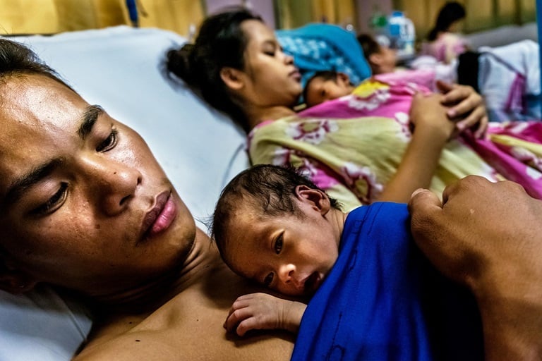 Skin-to-skin contact between parents and newborn babies after birth at San Miguel Birthing Facility, Tagum City, Davao del Norte.
