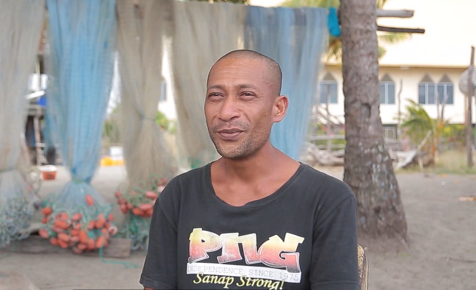 A climate change advocate outside in Papua New Guinea
